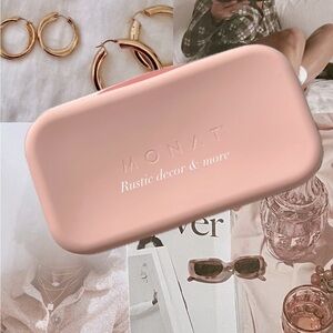 Monat pink silicone makeup bag and travel pouch
